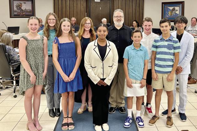 Delegates for the Sister Cities exchange trip to Nikaho, Japan are introduced to the Shawnee City Commission during Monday’s meeting. In no particular order, delegates include: Grove students Daniel Bowlan, Hudson McMains, Evy Simpson, Hartley Stephens, and Conner Vorndran; Liberty Academy student Bridge Uch; and Shawnee Middle School students Makaiah Baker and Kylee Ingram, Grove teacher Summer Proffer, and Delegate Chairman Michael Canaday. Photo provided