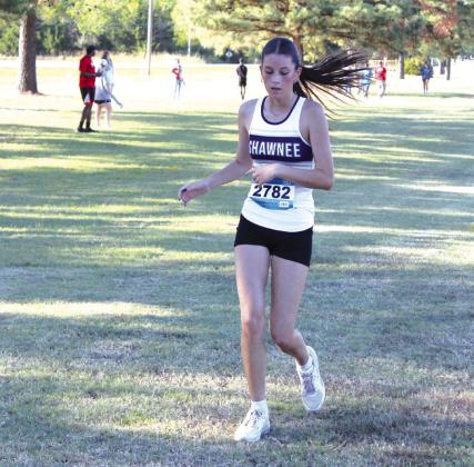Shawnee junior Annastasia Parilla finishes her race during the cross country meet held at Tecumseh High School on Sept. 10. Countywide &amp; Sun/Natasha Dunagan