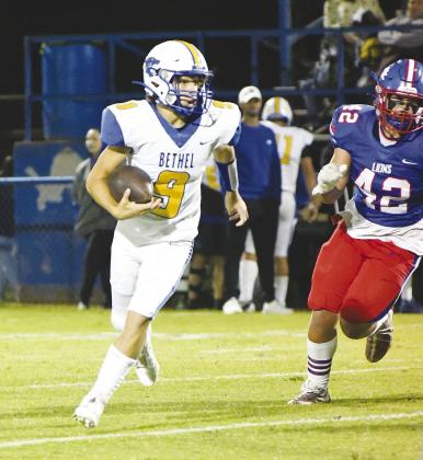 Bethel’s Maddox Davis (9 )tries to elude Chandler’s SamHall (42).