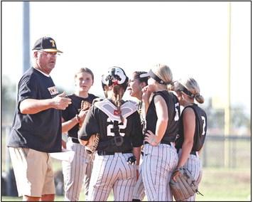 Tecumseh coach Chad Trahan talks strategy with the team. Photo courtesy of Gowin Photography