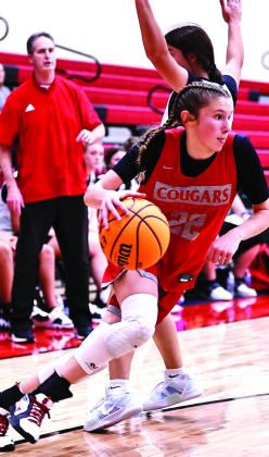 North Rock Creek’s NRC Kadence Munn drives past the defender towards the goal in a scrimmage against Stratford, Tuesday, Nov.