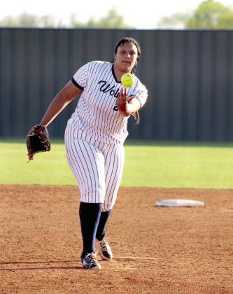 Shawnee's Karma Mason sends the ball sailing home in the game against Dale on April 15. This is Shawnee's first year to have slow pitch softball in the spring, although they have had fast pitch in the fall before. Hosting a triple header, the Lady Wolves lost to the Lady Pirates, 0-12, and to the Lady Wildcats, 0-14. Natasha Dunagan, Countywide &amp; Sun