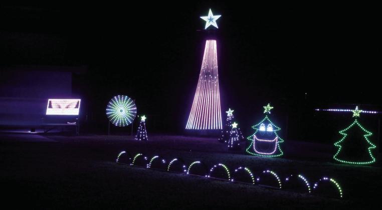 The Pottawatomie County Historical Society Light Show has moved outdoors this year, since they have installed a fence around the Paul and Ann Milburn Center. It features 13 Christmas songs programmed to synchronize with the light show, and it lasts about 26 minutes, said PCHS Director Ken Landry. Countywide &amp; Sun/Natasha Dunagan