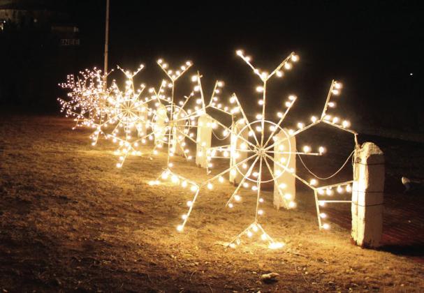 Seven snowflakes, which used to be on poles throughout Shawnee, have been restored and are on display in front of the Santa Fe Depot. The Pottawatomie County Historical Society received 50 snowflakes from the City of Shawnee and have been able to restore 13 with new LED lights so far. It takes about $60 in donations per snowflake, said PCHS Director Ken Landry. Countywide &amp; Sun/Natasha Dunagan