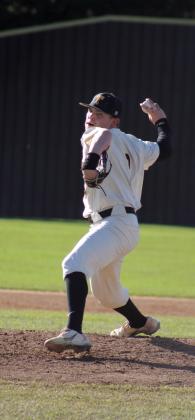 Tecumseh senior Kaiden Pounds winds up for the pitch during the April 4 game with North Rock Creek. The Savages lost, 0-3. Countywide &amp; Sun/Natasha Dunagan