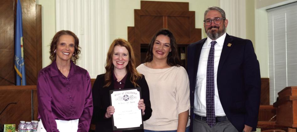 Kim Whitten, KC Campbell and District Attorney Adam Panter pose with Assistant District Attorney Lori McConnell who won the Prosecutor of the Year Award at the annual Domestic Violence Awareness &amp;amp; Awards Julie Talton, Countywide &amp;amp; Sun