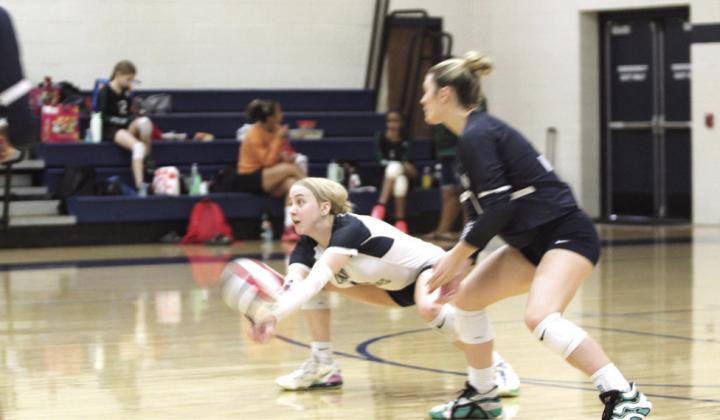 Shawnee senior Kylee Moore makes a save during the Shawnee Volleyball Invitational Silver Bracket game against North Rock Creek, held at Shawnee Middle School on Sept. 20. The Gold Bracket games were played at Shawnee High School. The Lady Wolves won two games and lost three during the two-day tournament. Eight teams, including Tecumseh, participated.