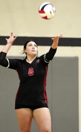 NRC's Tatum Williams serves during the Shawnee Volleyball Invitational game with SHS.
