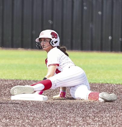 Senior Aubree Shivelhood safely steals second base.
