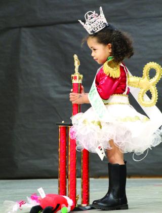 Mia Vernor, of Missouri, dressed as a toy soldier from the Nutcracker Ballet and won Supreme Baby during the Our Diamond Miss Christmas Pageant, held at Will Rogers Elementary on Dec. 7.
