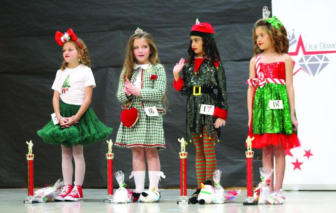 Hazel Mack of Shawnee; Kathryn Ashmore of Bethel; Prestynn Neely of Shawnee; and Peyton Neely of Shawnee each won a trophy at the Our Diamond Miss Christmas Pageant, held at Will Rogers Elementary School on Dec. 7. In their age division, Mack won Fashion Queen; Ashmore took Most Photogenic; Prestynn Neely won Most Beautiful; and Peyton Neely got Division Supreme. Countywide &amp; Sun/ Natasha Dunagan