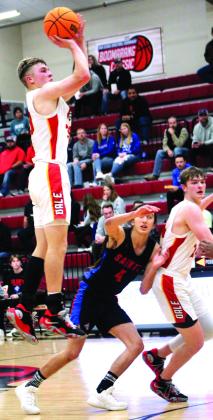 Dale’s Dayton Forsythe sinks a three-point shot during the third quarter of the final game against OCS