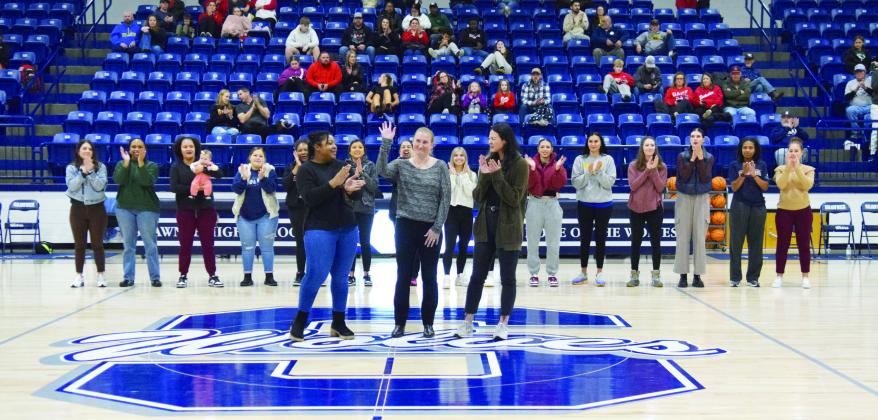 Current Lady Wolves Coach, Wendi Wells defies the norm and gets inducted into the SHS Hall of Fame while still coaching her girls. Coach Wells came to Shawnee 16 Seasons ago. In 2012, she led the Lady Wolves to a State Championship Victory and impressive 29-0 record. Several former players came home to support her induction during the half time festivities on Jan. 26. Countywide &amp; Sun/Julie Talton