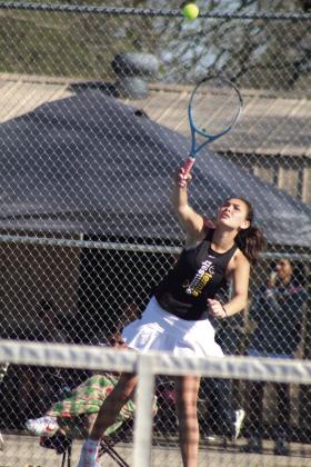 Tecumseh’s Jalee Meyers serves on the #1 Doubles team with Elise Whitney during the Tecumseh Tennis Tournament on April 3.