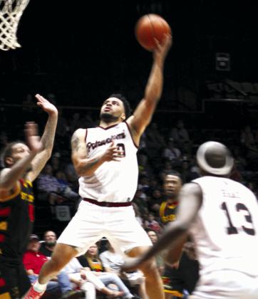 Potawatomi Fire Guard Deshawn Munson aims and hits the bucket in the second game of the TBL Finals with the St. Louis Griffins at FireLake Arena on June 26, 2023. They won 127-95 to force the third game on June 27. File photo