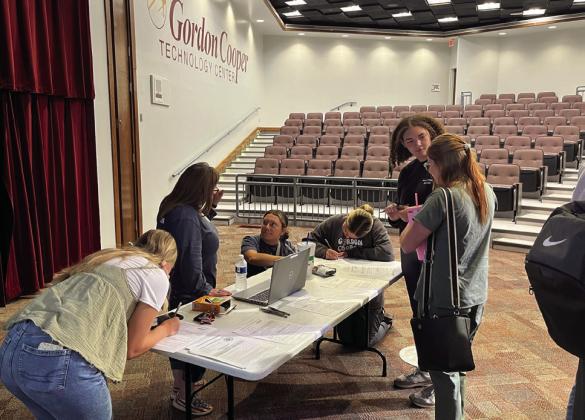 Members of GCTC American Spirit Team Help other students register to vote. Photo provided by GCTC