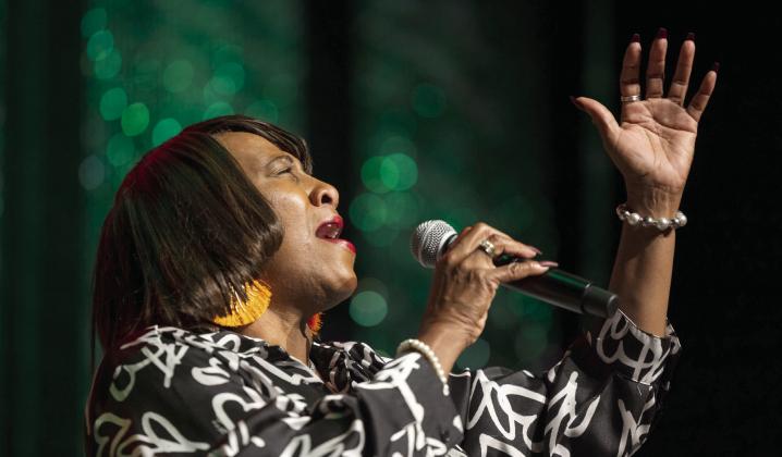 Anice Young sings with the Acapella Connection at the Citizen Potawatomi Nation and Dunbar Heights Group Juneteenth VIP Reception, held at the Grand Casino Hotel and Resort on June 12.