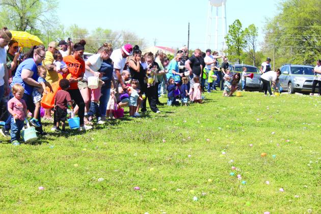 The 0 to 2 age group lines up with their parents before they start the first egg hunt of the day for the Tecumseh EGGsperience and Block Party on April 8. Countywide &amp;amp; Sun/Natasha Dunagan