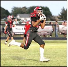 North Rock Creek’s Caleb Hawkins catches a TD pass from Landon Kelough.