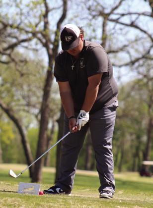 Tecumseh senior Bryscon Cosper prepares to drive toward the 10th hole at FireLake Golf Course during the Tecumseh Boys Golf Tournament on April 11.