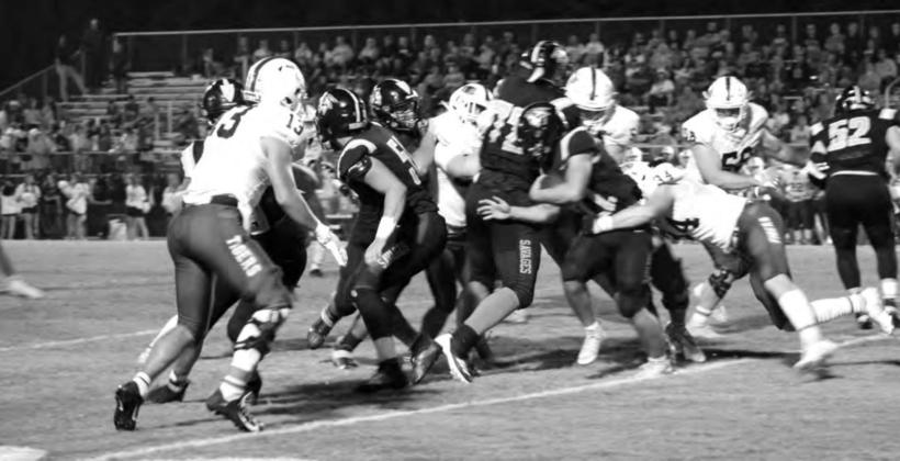 Tecumseh sophomore Maddox Anderson carries the ball for a third down and 12, as a Tuttle player tries to take him down, during the third quarter of the home game on Oct. 1. Tecumseh lost 0-44. Countywide &amp;amp; Sun/Natasha Dunagan