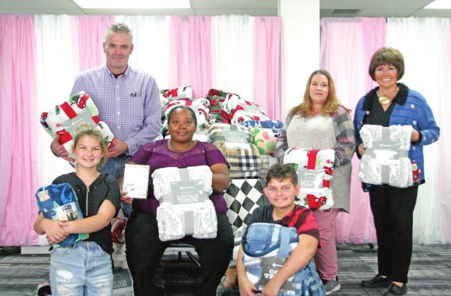 Volunteers Prepare A Trunkmas Party For Foster Children