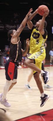 Potawatomi Fire Forward Ruston Hayward puts up a shot in the fourth quarter of the May 23 home game. The Fire was scheduled to play the Shreveport-Bossier Mavericks, but it was a forfeit. So, they played members of their own team and still won, 160-126. After winning an away game against the Enid Outlaws on May 26, they are the only TBL team to have a undefeated regular season, with a record of 20-0. They will compete against the Wichita Skykings in the first playoff game tonight in Enid at 5 pm.