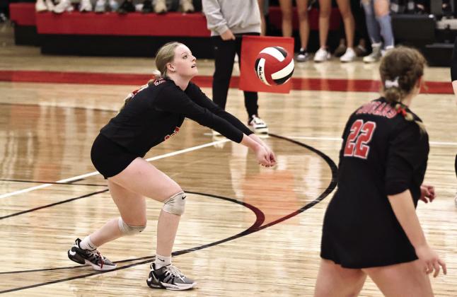 North Rock Creek’s Ryleigh Lay with a dig in regional action last week. Photo courtesy of Gowin Photography
