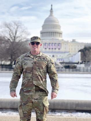 Army National Guardsman Joseph English poses in front of the United States Capitol building earlier this month. English was in Washington, DC to help with the Presidential Inauguration. Photo provided by Shawna English.