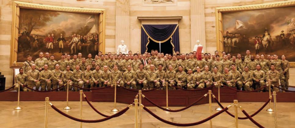 Army National Guardsman Joseph English poses with the 745th Military Police Law &amp; Order Detachment, who were in Washington, DC, for the Presidential Inauguration on Jan. 20. Photos provided by Shawna English.