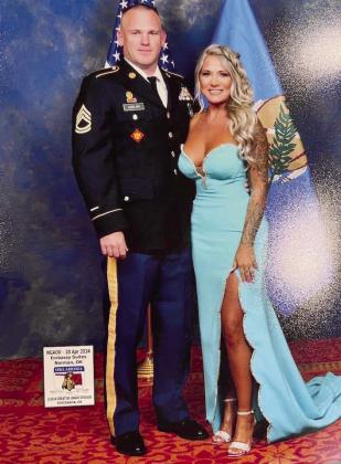 Army National Guardsman Joseph English poses with his wife Shawna at an event in April 2024.