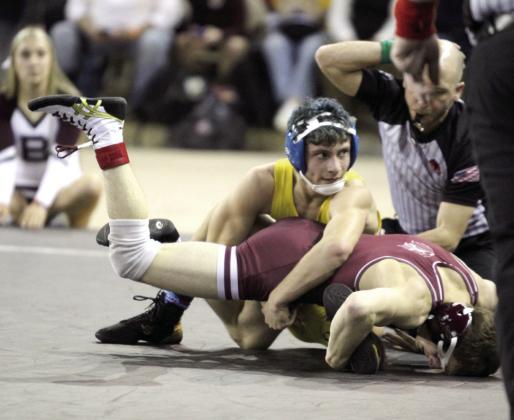Bethel sophomore Paxton Shultz tries to flip his opponent in the 120 weight division of the OSSAA Class 3A Boys Wrestling State Championship on Mar. 1 at the State Fair Arena. Shultz placed second in the state. Natasha Dunagan, Countywide &amp; Sun