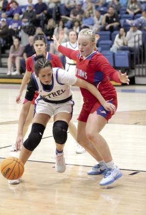 Bethel junior Alexis Tucker dodges the Chandler defense on her way to the bucket in the Class 3A Regional Tournament game with Chandler on Feb. 27. The Lady Wildcats won, 52-44, but lost their second regional game against Washington on March 1, 30-74. They will begin area play against Atoka at Ada High School today (March 6) at 6 pm. Natasha Dunagan, Countywide &amp; Sun