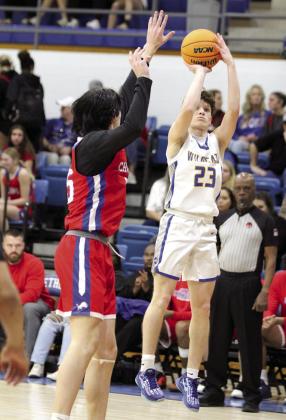 Bethel junior Darius Cheatham makes a three-pointer in the Class 3A Regional Tournament against Chandler on Feb. 27. The Wildcats lost this game, 50-65, but they won with Silo, 55-49, on Feb. 28, and with Dickson, 65-61, on March 1. They will begin area play today (March 6) against Marlow at Ada High School at 2:30 pm. Natasha Dunagan, Countywide &amp; Sun