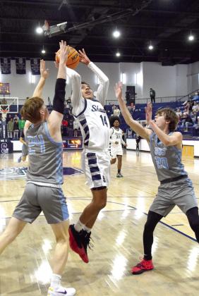 Shawnee Wolves Win 52-49