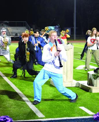 Senior Zachary Riggle performs, for the last time on home field,in the Halloween night half-time show dressed as Fred Jones (Mystery Inc leader). Julie Talton, Countywide &amp;amp; Sun
