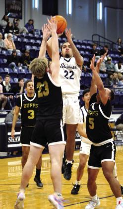 Shawnee’s Jalen Wicks makes his jumpshot during the second quarter of the game against McAlester on Jan. 3. The Wolves lost, 46-52, and the Lady Wolves won their game, 50-48, in overtime. Countywide &amp; Sun/Natasha Dunagan