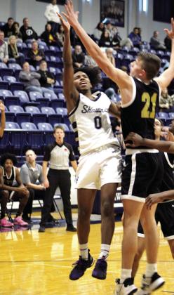 Shawnee’s Daytain Patton shoots for two during the game against McAlester on Jan. 3.
