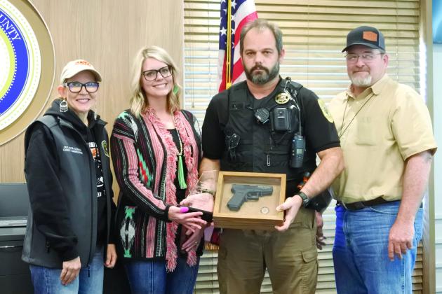 The Board of County Commissioners presented the Medal of Valor Deputy Gary Knoles of the Pott County Sheriff’s Office Thursday, Dec. 12. Knoles was shot seven times when dispatched to a possible domestic violence call on Oct. 29, 2021. Countywide &amp; Sun/Suzie Campbell