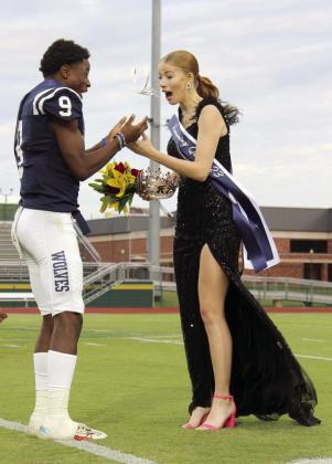 Shawnee Homecoming King Delmone Miller and Queen Maryl Lewellen try to catch her crown after it fell off during the coronation, held at OBU on Oct. 6. Countywide &amp; Sun/Natasha Dunagan
