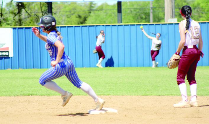 Bethel sophomore Bailey Tucker sprints from second to third base before the throw. Natasha Dunagan, Countywide &amp;amp; Sun