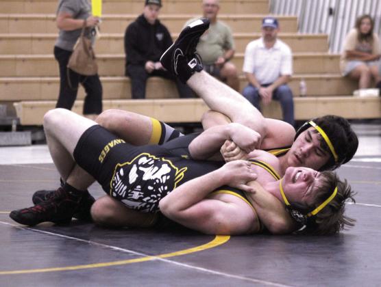 Zane Kinsey keeps a firm grasp on Keegan Miller at Tecumseh's Black and Gold Dual held at the THS Alumni Center on Nov. 17. Cheyanna Dietz, Countywide &amp;amp; Sun