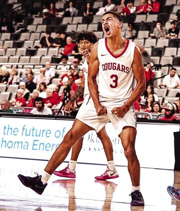 Tyson Hawkins gets pumped after making a basket before halftime, but NRC came up short against Fort Gibson in the quarterfinals of the state tournament, losing 47- 44. A weather delay due to a tornado warning interrupted the game in the final quarter (similar to their experience from last year). Photos Courtesy of Gowin Photography