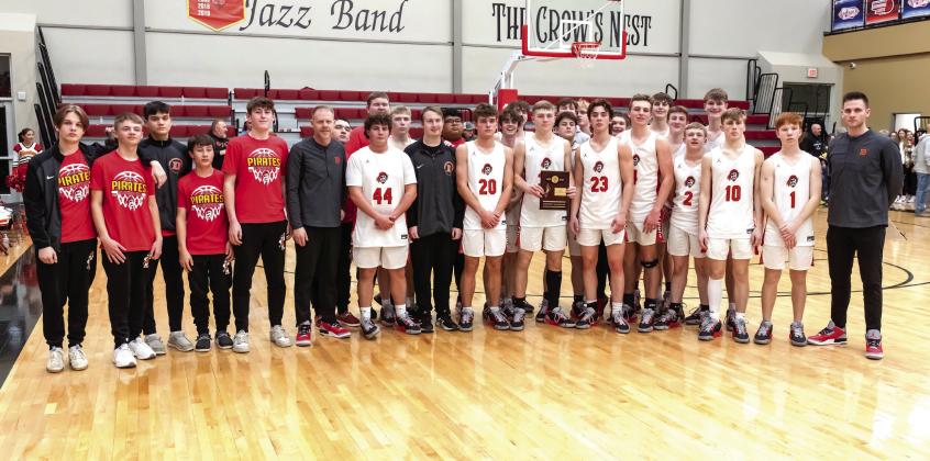 Pictured left, the Dale Pirates won the Class 2A District Championship at home on Feb. 18. They defeated Wynnewood, 87-43, and have a record of 26-0. The Pirates will play in Regionals, also at Dale, tonight (Feb. 23) at 7:30 pm. Photo provided.