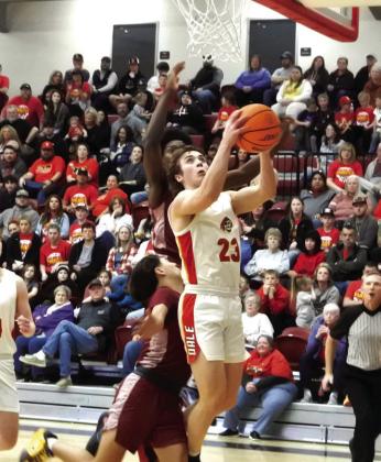 Dale junior Deken Jones concentrates on the bucket during the Class District home game.