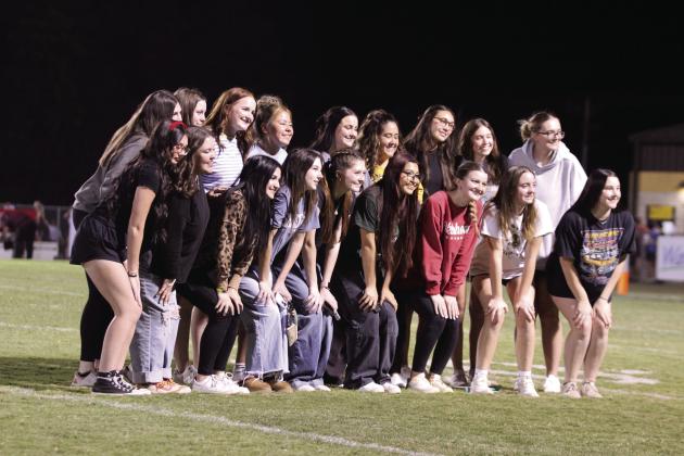 The Tecumseh High School Volleyball Team poses during halftime of the home football game on Oct. 10. The Lady Savages hosted the Class 4A Regional Volleyball Tournament that same day and won over Seminole, 3-0 (25-11, 25-14, 25-11), and against Catoosa, 3-0 (25-14, 25-21, 25-23). They will compete against Community Christian in the state competition today (Oct. 17) at Sapulpa High School at 2:45 pm. Countywide &amp;amp; Sun/Natasha Dunagan