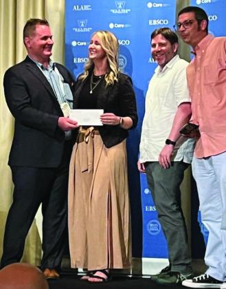 From left to right: Presented the award: Gregg Dodd, Chair of the John Cotton Dana Award Committee and Director of Marketing &amp;amp; Communications for Columbus Metropolitan Library; Representing PLS: Kelly Sitzman, Kevin Mix, Drew Hooper; Not pictured: Diana Ring, Lunden England.