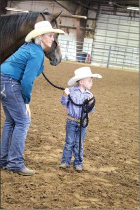 Olan Roller and his mother show their horse in the Pottawatomie County Horse Show at the Free Fair on Sept. 9. Roller’s horse received second place in the Senior Mares class. Countywide &amp; Sun/Natasha Dunagan