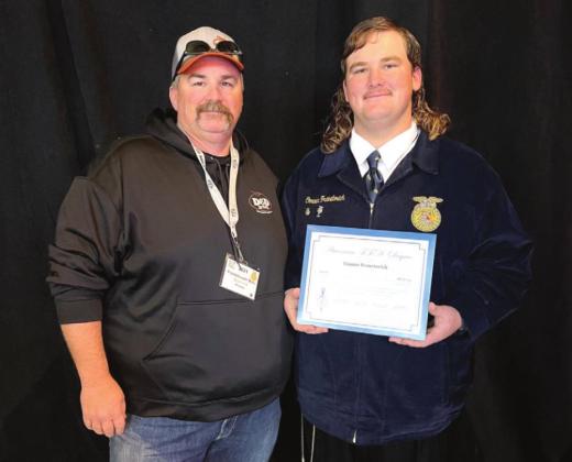 Bethel FFA member Conner Franetovich poses with his father and Bethel FFA alum Mike Franetovich after receiving his American FFA Degree. Photo provided.