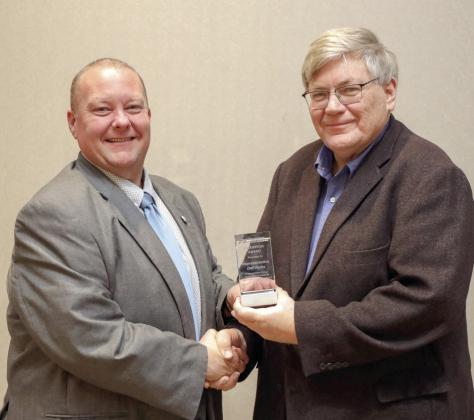 OKFB President Rodd Moesel (right) presents Rep. Dell Kerbs with an Oklahoma Farm Bureau Champion award at the 2024 OKFB Leadership Conference Feb. 13. Photo provided
